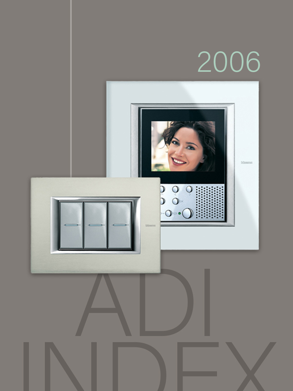 Two BTicino Axolute products: the video intercom and the 3-module cover plate, on a grey background.