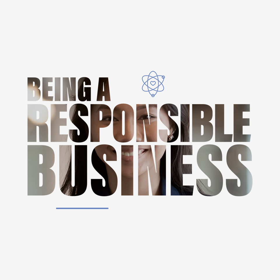 Text overlay on image of a smiling young woman: Being a Responsible Business.