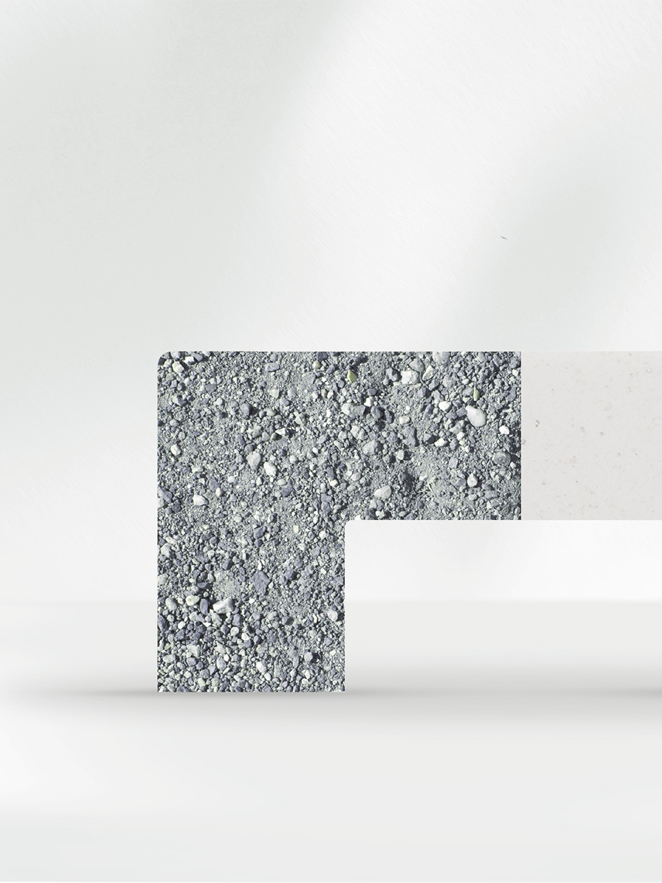 Raw mica and the smooth white finish recreates the half shape of a Light Now cover plate.