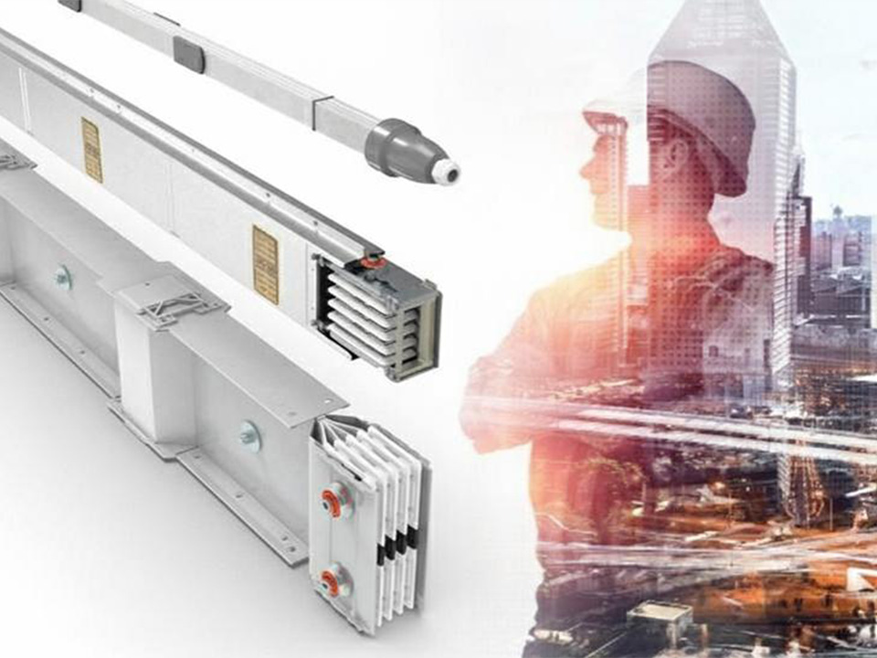 Zucchini Busbars on the left; to the right, a semi-transparent image of a worker and city skyline.